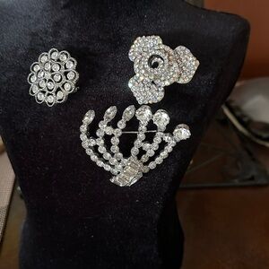 3 brooches  , one is marked continental